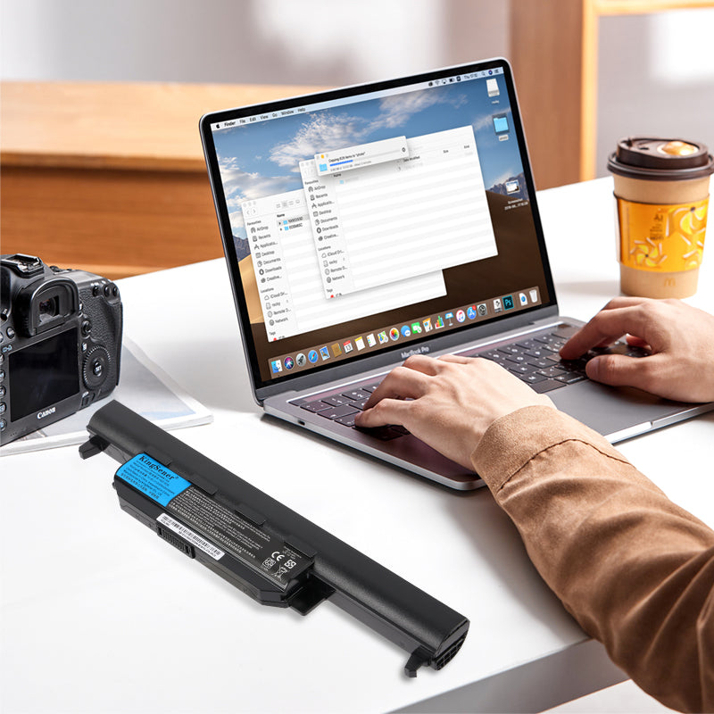 What should I do if my laptop battery makes noise when charging?