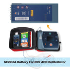 M3863A replacement battery for Philips FR2 Plus defibrillator kit, 12V 4.2Ah LiMnO2, shown with AED carrying case and electrode pads